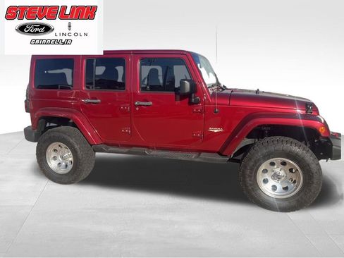 Used 2013 Jeep Wrangler Unlimited Sahara w/ Dual Top Group AWD/4WD image 2