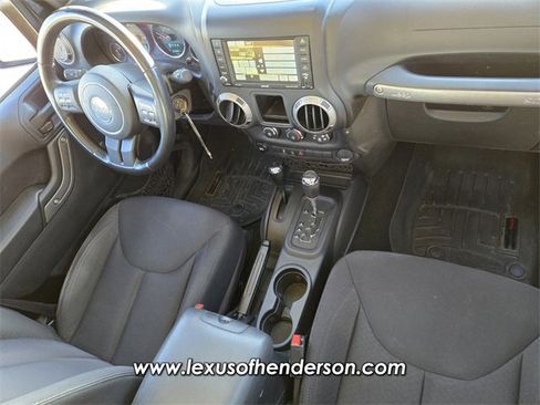 Used 2014 Jeep Wrangler Unlimited Sport w/ Mopar Black Appearance Group image 16