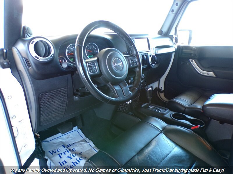 Used 2012 Jeep Wrangler Unlimited Sahara w/ Dual Top Group AWD/4WD image 13