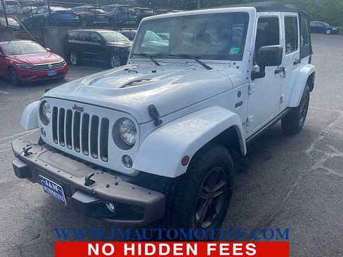 Used 2016 Jeep Wrangler Unlimited Sahara AWD/4WD image 1