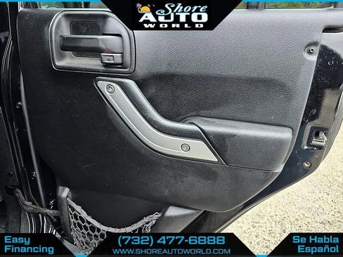 Used 2014 Jeep Wrangler Unlimited Sahara w/ Dual Top Group AWD/4WD image 22