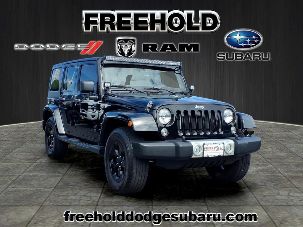 Used 2014 Jeep Wrangler Unlimited Sahara w/ Dual Top Group AWD/4WD image 1