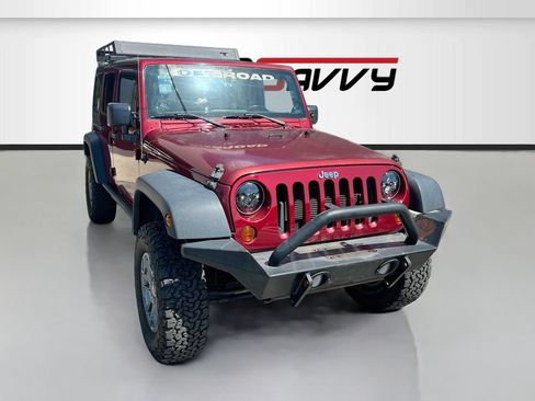 Used 2012 Jeep Wrangler Unlimited Sport AWD/4WD image 1