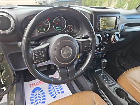 Used 2015 Jeep Wrangler Unlimited Sahara w/ Dual Top Group AWD/4WD image 12