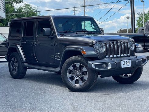Used 2018 Jeep Wrangler Unlimited Sahara w/ Dual Top Group AWD/4WD image 1