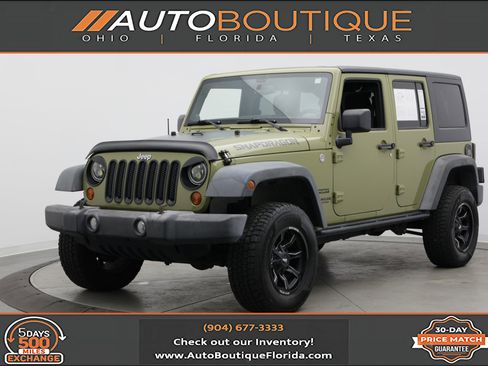 Used 2013 Jeep Wrangler Unlimited Sport AWD/4WD image 1