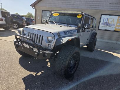 Used 2014 Jeep Wrangler Unlimited Sahara w/ Dual Top Group