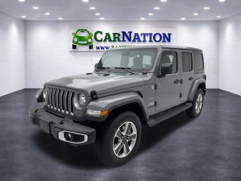 Used 2021 Jeep Wrangler Unlimited Sahara w/ Uconnect 4C Nav & Sound Group AWD/4WD image 1