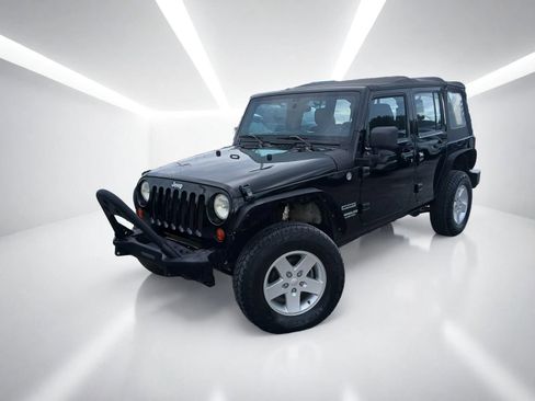 Used 2012 Jeep Wrangler Unlimited Sport AWD/4WD image 1