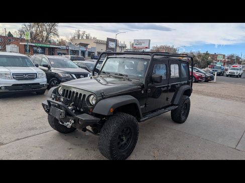 Used 2011 Jeep Wrangler Unlimited Sport image 1