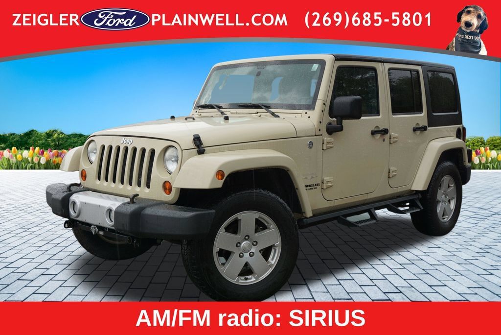 Used 2011 Jeep Wrangler Unlimited Sahara w/ Dual Top Group AWD/4WD image 1