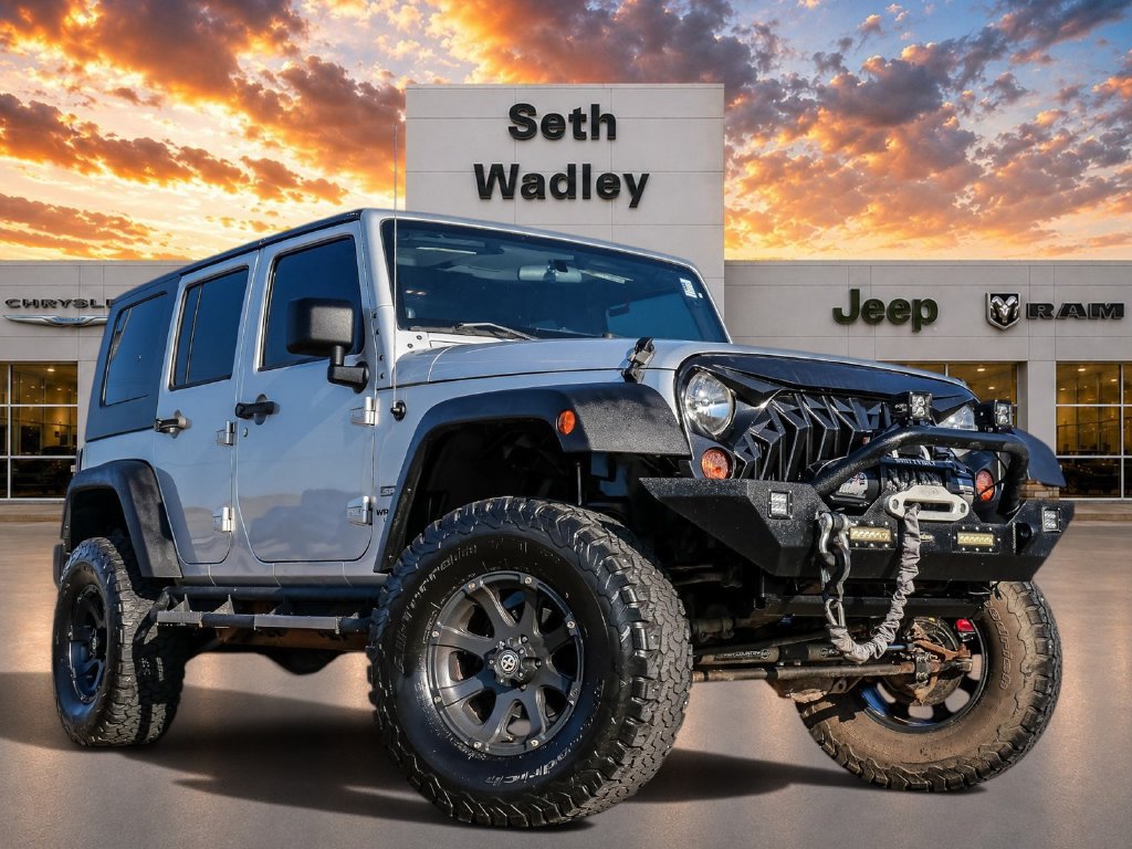 Used 2010 Jeep Wrangler Unlimited Sport AWD/4WD image 1