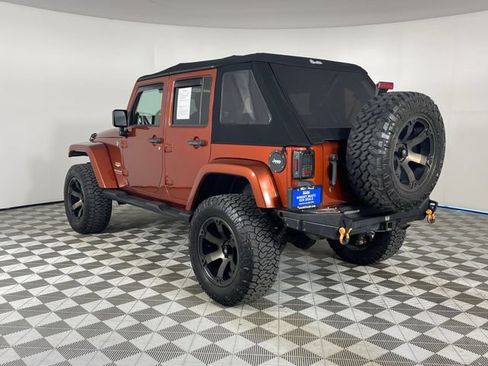 Used 2014 Jeep Wrangler Unlimited Sahara w/ Dual Top Group AWD/4WD image 22