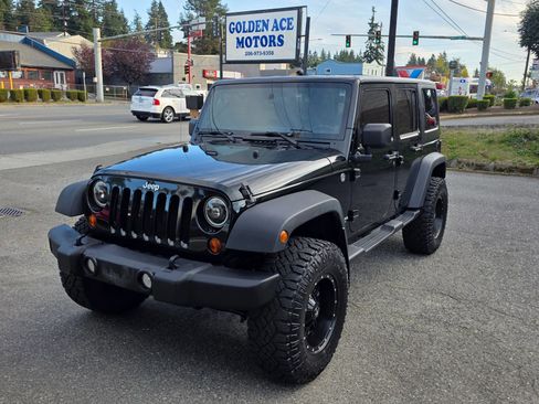 Used 2012 Jeep Wrangler Unlimited Rubicon w/ Connectivity Group image 1