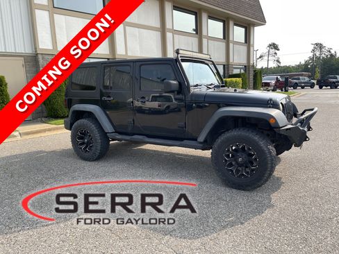 Used 2012 Jeep Wrangler Unlimited Sport AWD/4WD image 1