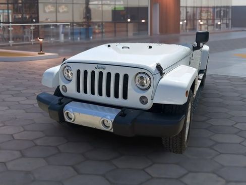 Used 2015 Jeep Wrangler Unlimited Sahara w/ Mopar Chrome Edition Group AWD/4WD image 24