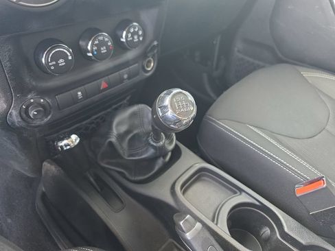 Used 2015 Jeep Wrangler Unlimited Rubicon w/ Dual Top Group AWD/4WD image 36
