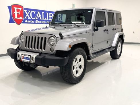 Used 2014 Jeep Wrangler Unlimited Sahara w/ Max Tow Package AWD/4WD image 8