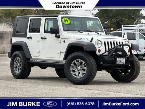Used 2009 Jeep Wrangler Unlimited Rubicon w/ Dual Top Group image 1
