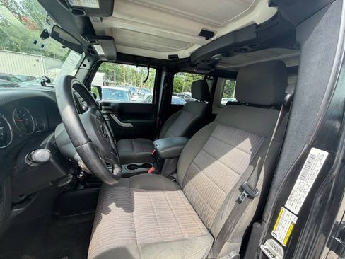 Used 2012 Jeep Wrangler Unlimited Rubicon w/ Dual Top Group AWD/4WD image 11