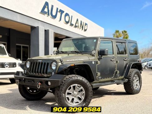 Used 2015 Jeep Wrangler Unlimited Rubicon w/ Dual Top Group AWD/4WD image 1