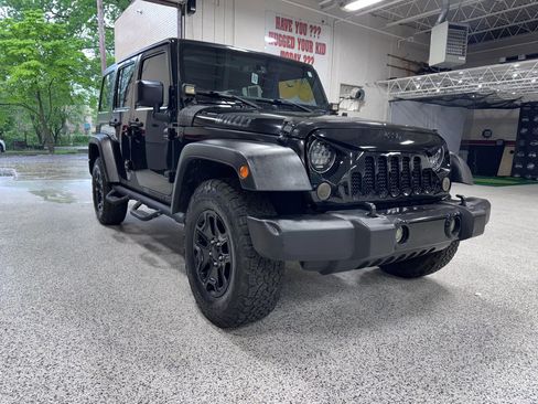 Used 2015 Jeep Wrangler Unlimited Sport AWD/4WD image 1