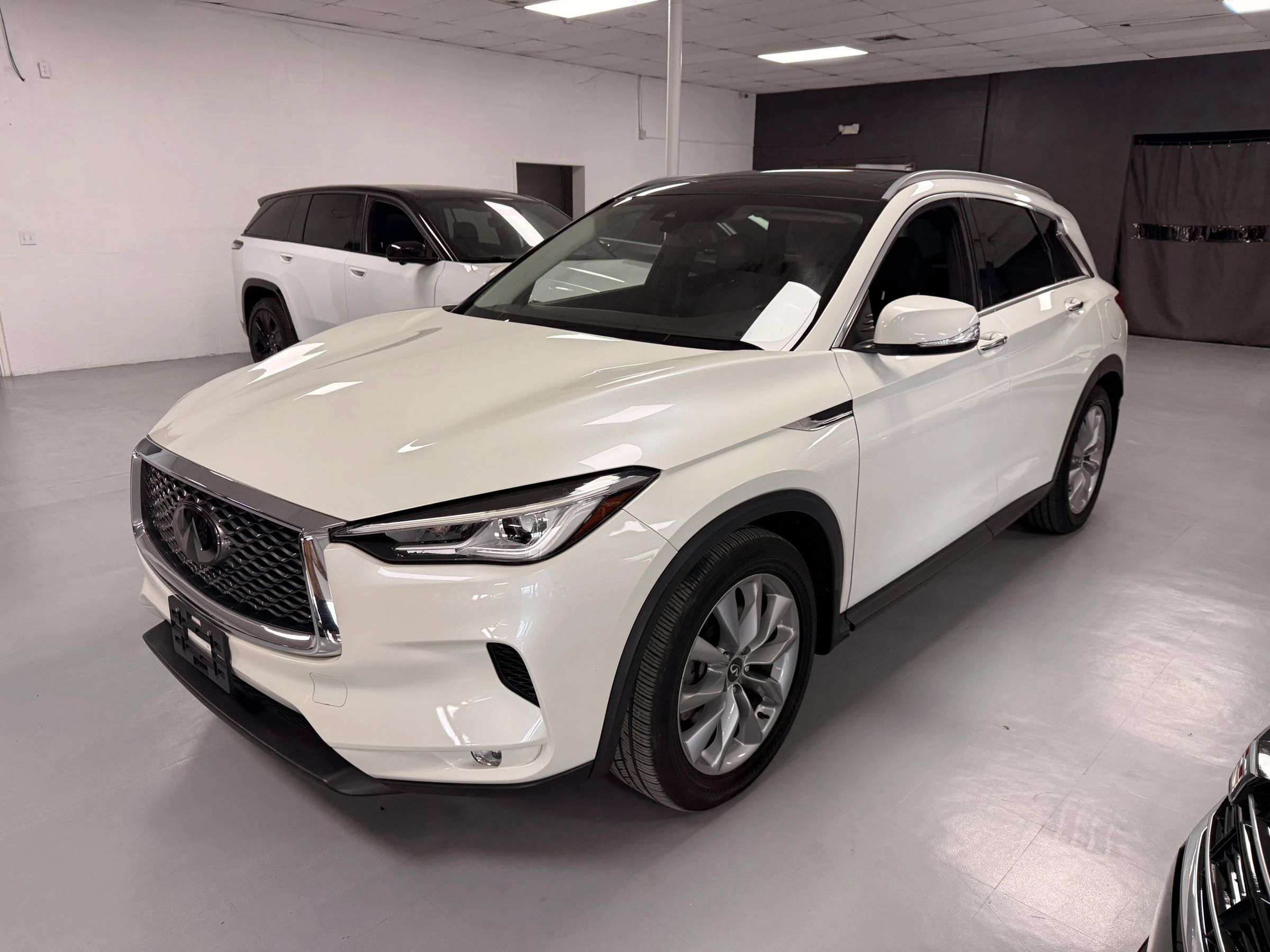 Used 2021 INFINITI QX50 Luxe FWD image 1
