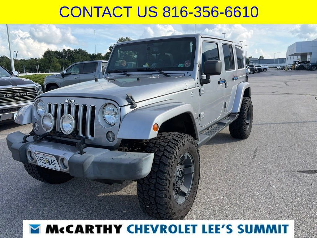 Used 2016 Jeep Wrangler Unlimited Sahara w/ Dual Top Group AWD/4WD image 1