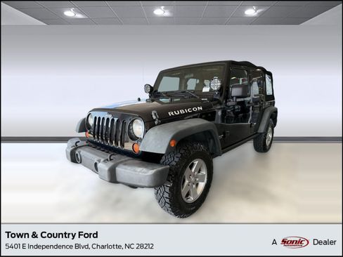 Used 2011 Jeep Wrangler Unlimited Rubicon w/ Connectivity Group AWD/4WD image 1