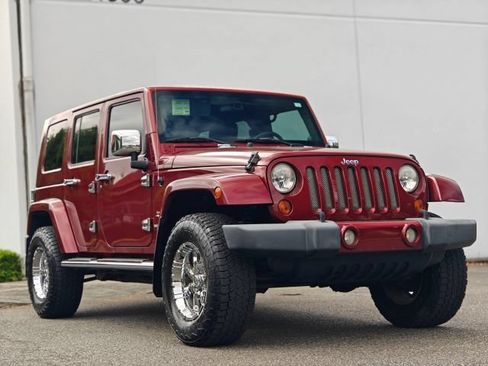 Used 2009 Jeep Wrangler Unlimited Sahara w/ Trailer Tow Group AWD/4WD image 1