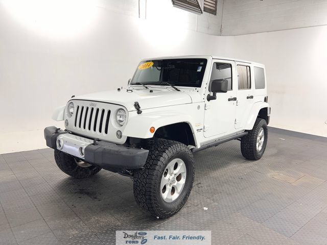 Used 2014 Jeep Wrangler Unlimited Sahara w/ Dual Top Group AWD/4WD image 1