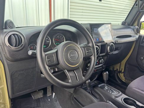 Used 2013 Jeep Wrangler Unlimited Sport w/ Mopar Black Appearance Group image 12