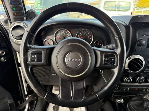 Used 2011 Jeep Wrangler Unlimited Sahara w/ Mopar Chrome Edition Group AWD/4WD image 16