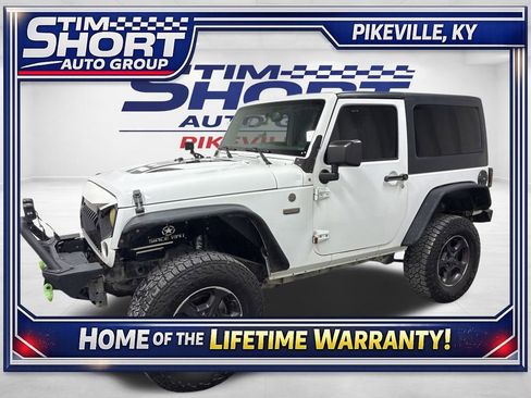 Used 2016 Jeep Wrangler Sahara image 1