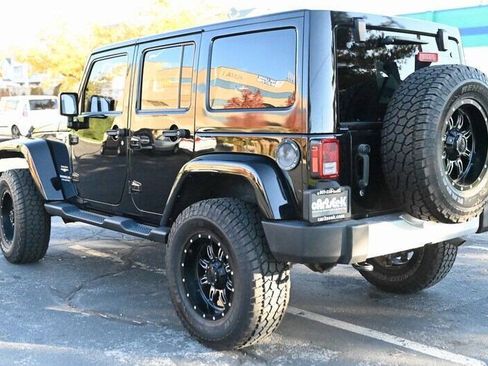 Used 2015 Jeep Wrangler Unlimited Sahara w/ Dual Top Group AWD/4WD image 8