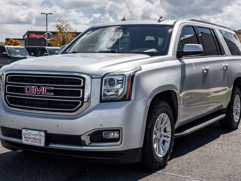 Used 2017 GMC Yukon XL SLT w/ Open Road Package AWD/4WD image 1