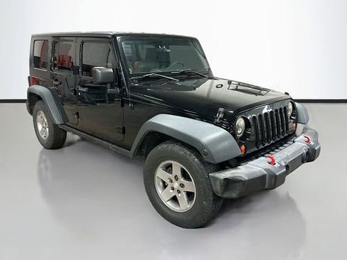Used 2010 Jeep Wrangler Unlimited Rubicon w/ Dual Top Group image 3