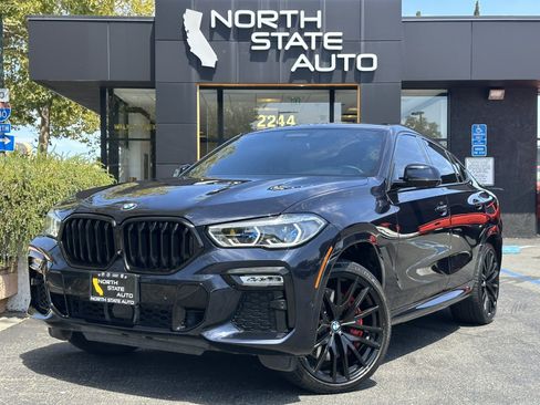 Used 2021 BMW X6 M50i w/ Executive Package AWD/4WD image 1