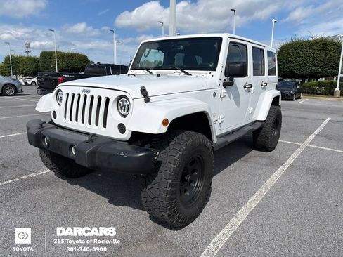 Used 2014 Jeep Wrangler Unlimited Sahara w/ Connectivity Group AWD/4WD image 1