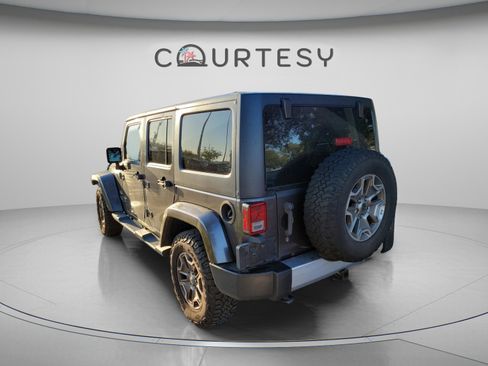 Used 2014 Jeep Wrangler Unlimited Sahara w/ Connectivity Group AWD/4WD image 8