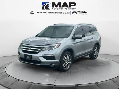 Used 2016 Honda Pilot Touring image 1