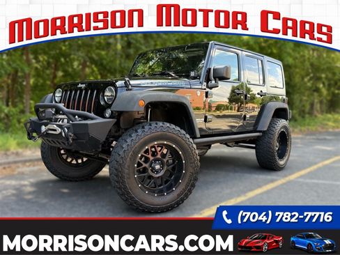 Used 2015 Jeep Wrangler Unlimited Rubicon w/ Dual Top Group AWD/4WD image 1