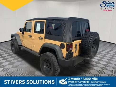 Used 2013 Jeep Wrangler Unlimited Sport w/ Mopar Black Appearance Group AWD/4WD image 10
