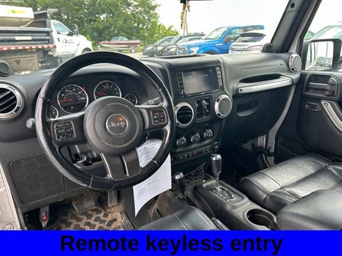 Used 2012 Jeep Wrangler Unlimited Sahara w/ Dual Top Group AWD/4WD image 11
