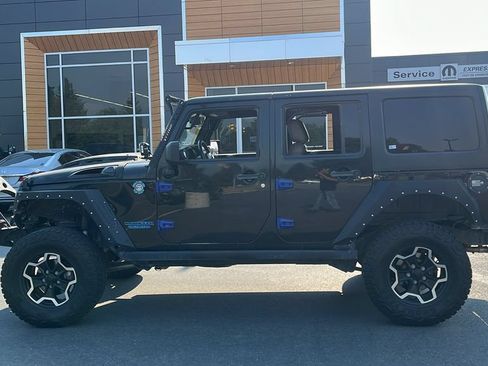 Used 2013 Jeep Wrangler Unlimited Rubicon w/ Dual Top Group AWD/4WD image 8