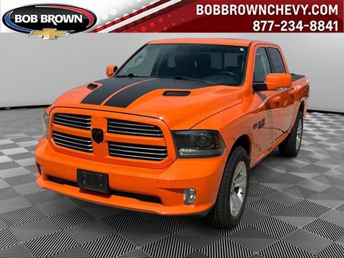 Used 2015 RAM 1500 Sport w/ Ignition Orange Sport Package AWD/4WD image 1
