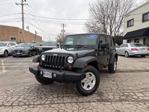 Used 2012 Jeep Wrangler Unlimited Sport AWD/4WD image 1