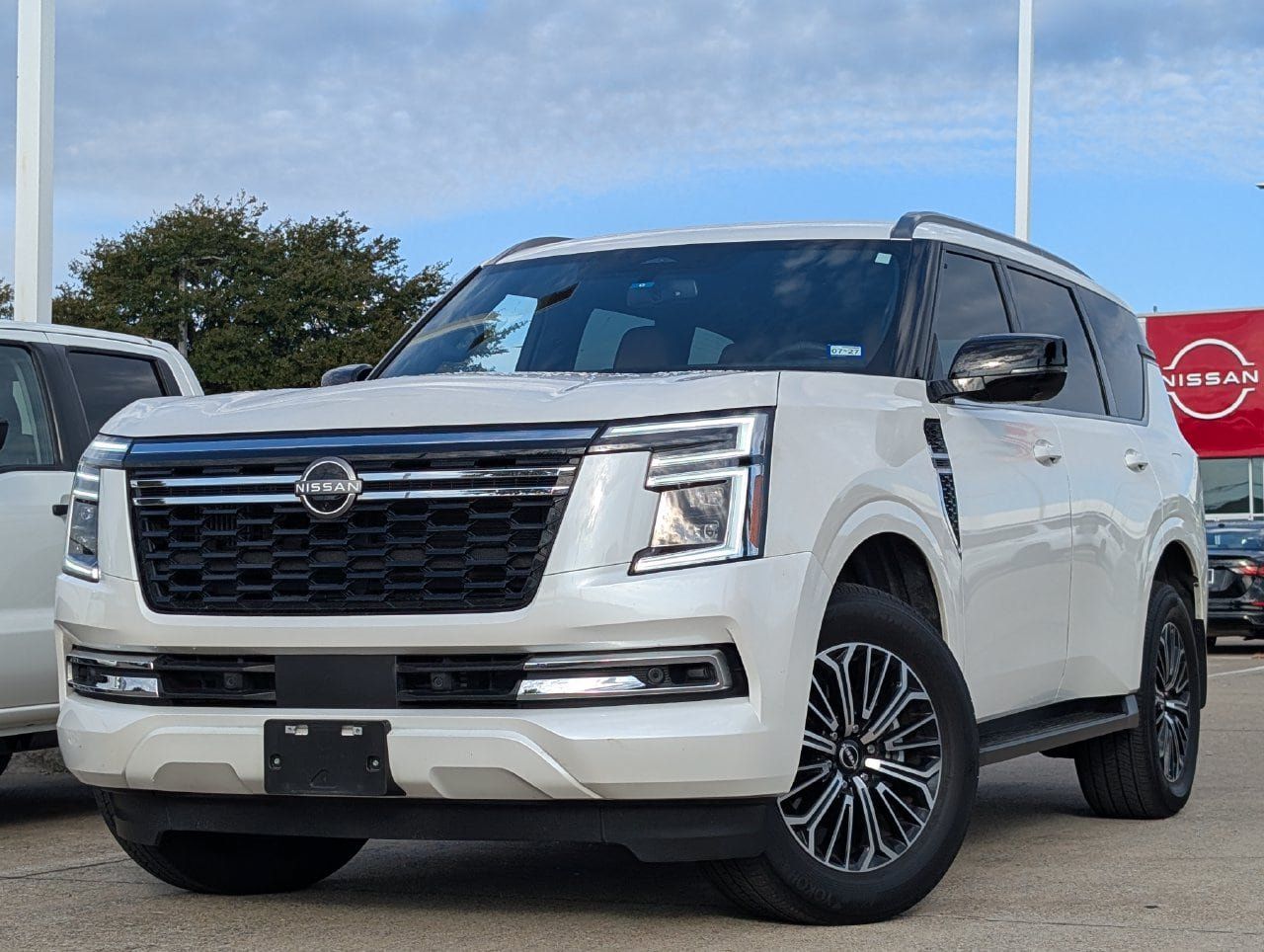 Used 2025 Nissan Armada SL w/ Captain's Chari Seat Package RWD image 1