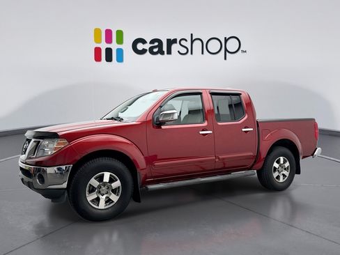 Used 2014 Nissan Frontier SL w/ SL Moonroof Package AWD/4WD image 1