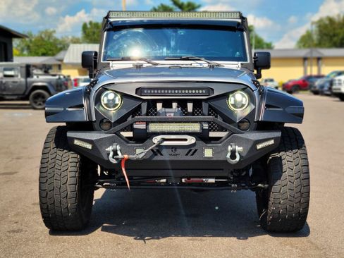 Used 2013 Jeep Wrangler Unlimited Sahara w/ Connectivity Group AWD/4WD image 2